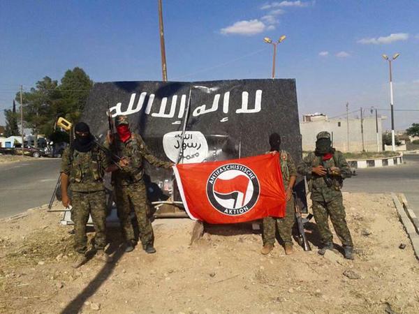 Anti-fascist flag raised as Kurds advance on ISIS